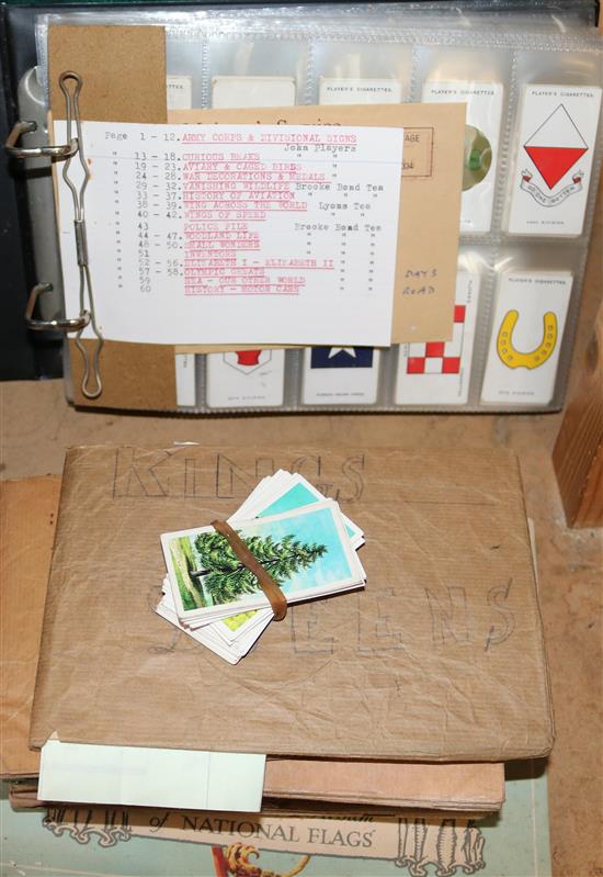 A pair of albums of cigarette cards etc